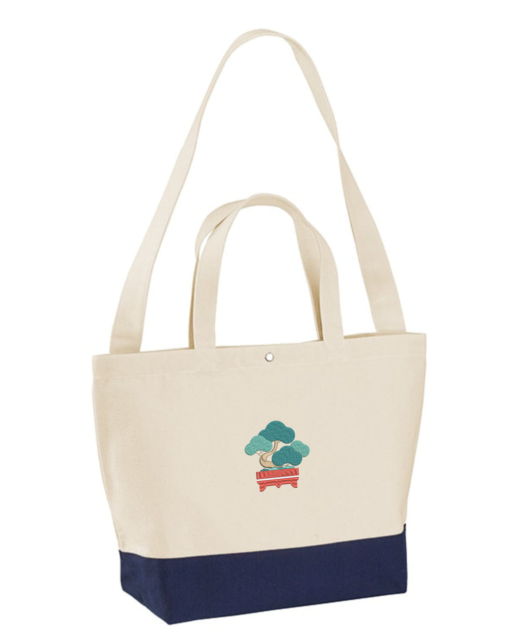 Andrew Joyce embroidered 17L eco-sustainable two-tone tote bag in beige and navy with intricate japanese bonsai embroidered art.