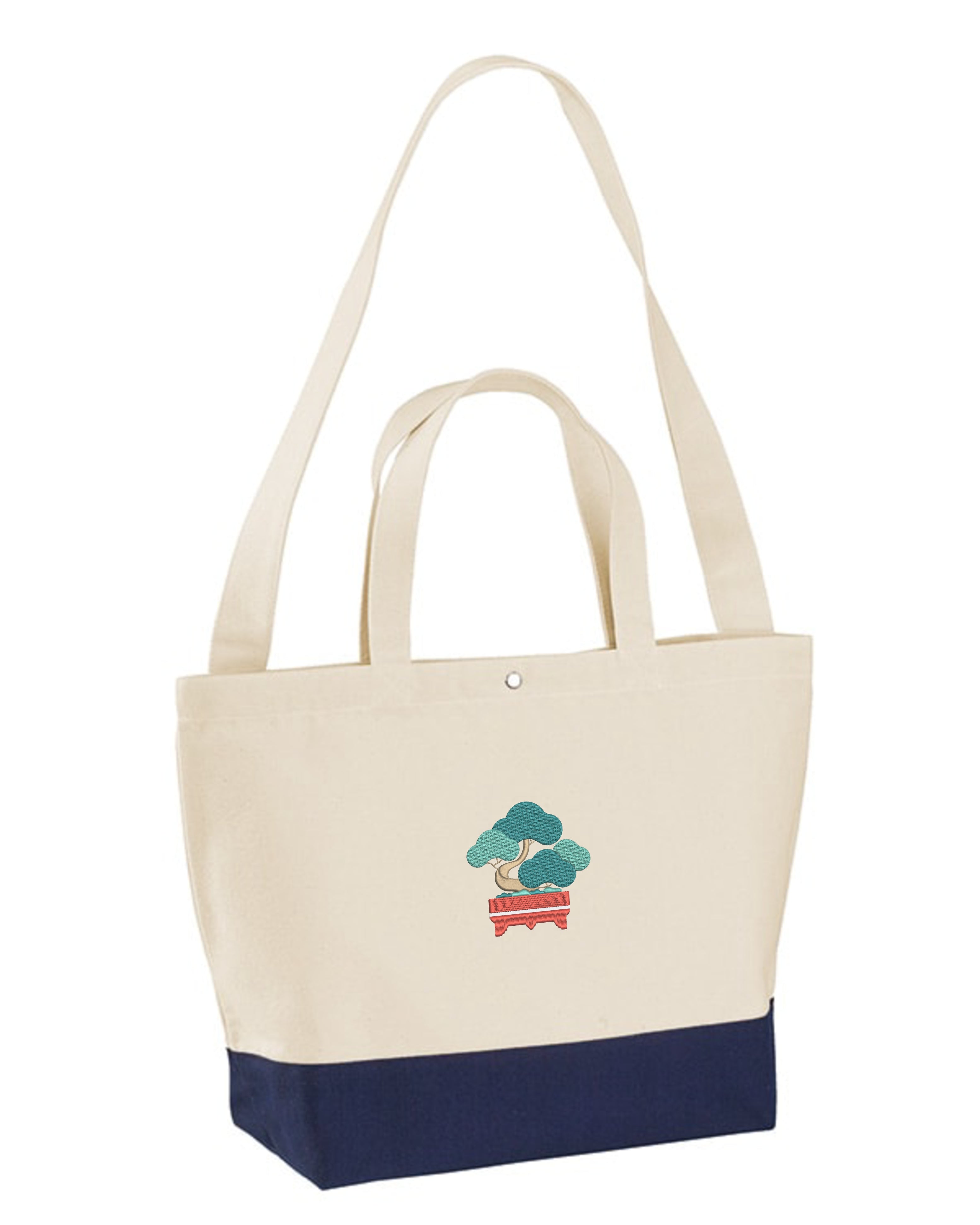 Andrew Joyce embroidered 17L eco-sustainable two-tone tote bag in beige and navy with intricate japanese bonsai embroidered art.