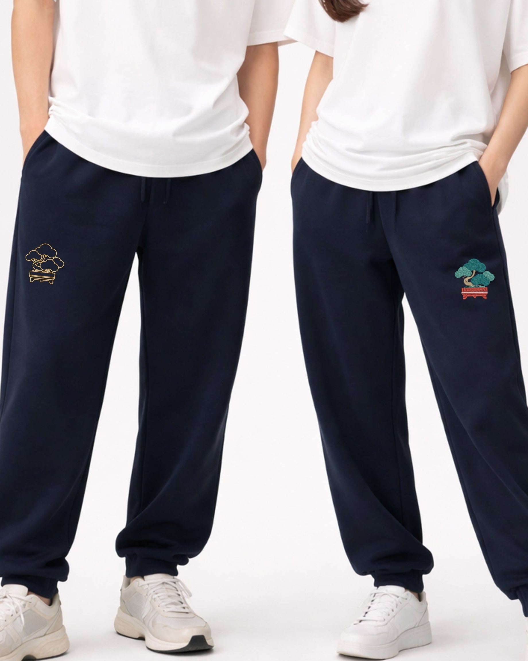 Detail shot of Andrew Joyce bespoke embroidery on 300gsm navy cotton sweatpants with Bonsai textured stitch finish.