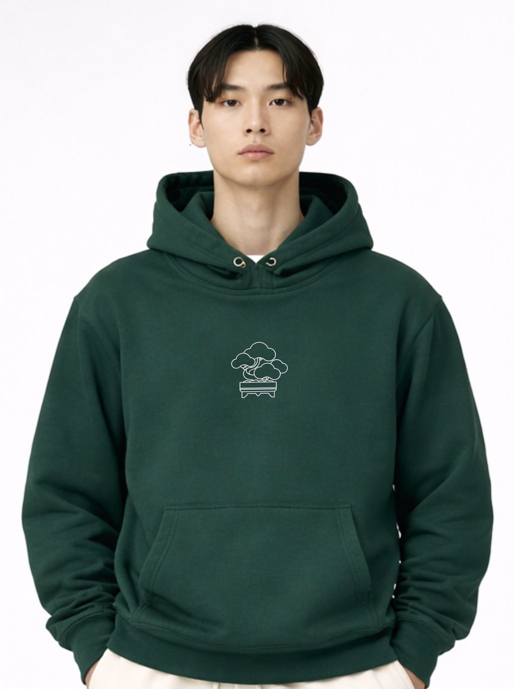 Japanese Bonsai embroidery selectable minimal gold line art or textured finishDiscover the Andrew Joyce 450 GSM Forest Green pullover hoodie. Museum-quality embroidery and heavyweight cotton. Exclusive artist collaboration.
