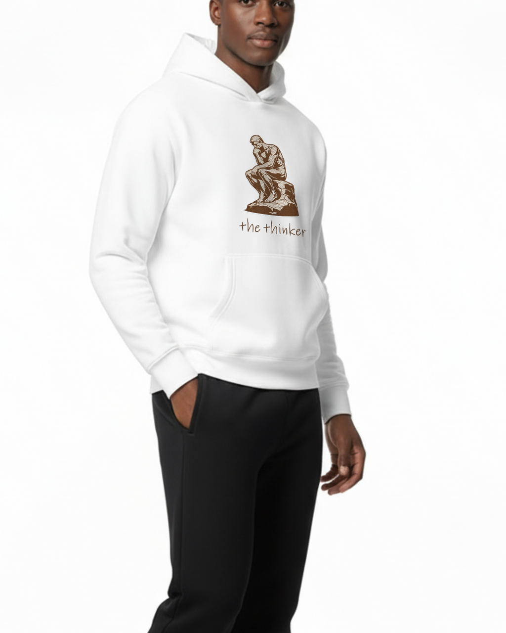 Person wearing a white hoodie with the thinker embroidered and black pants on a white background