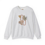 Sudadera con capucha y bordado botánico abstracto en tonos terrosos | Sudadera | Camiseta